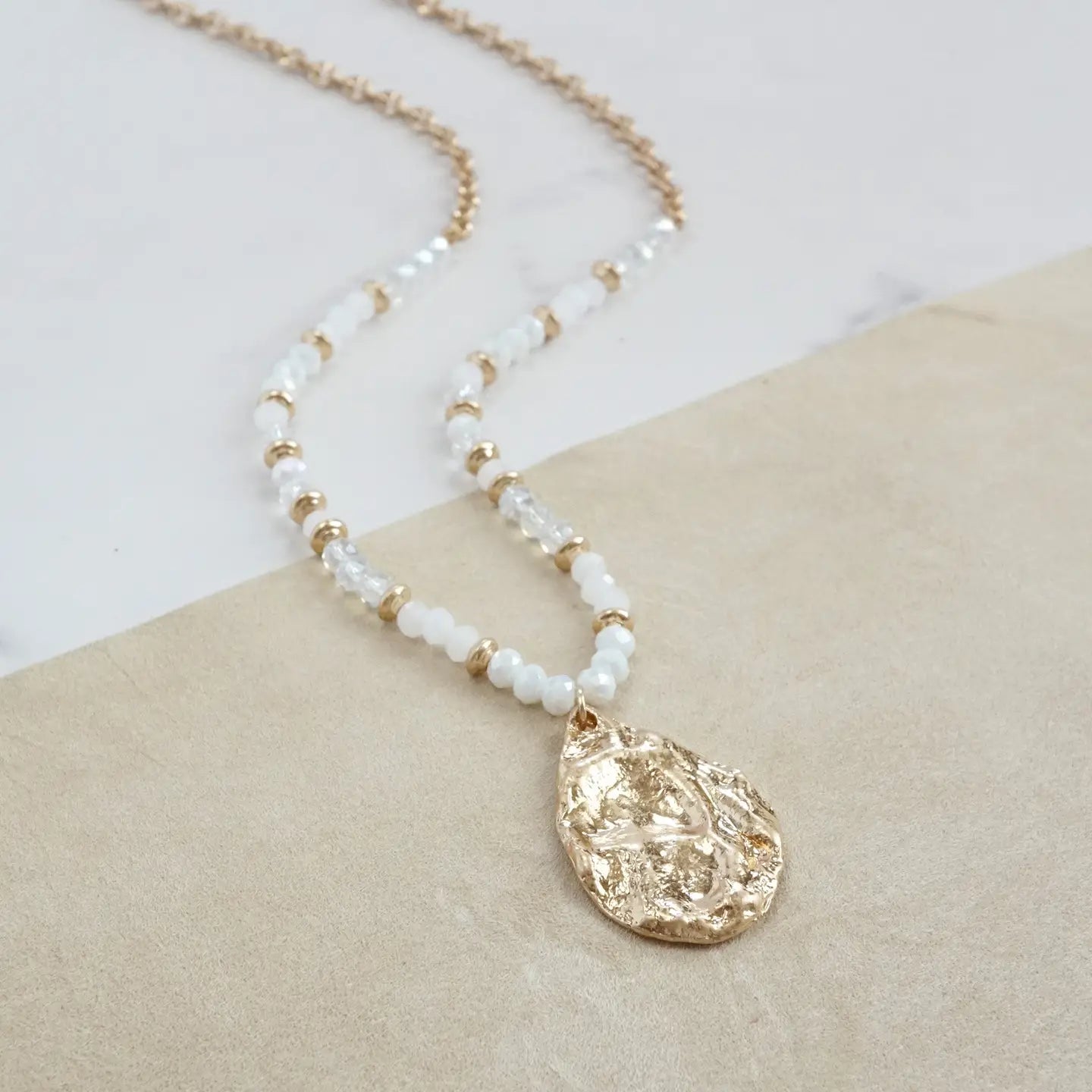 Long Beaded Necklace with Golden Teardrop Pendant - White